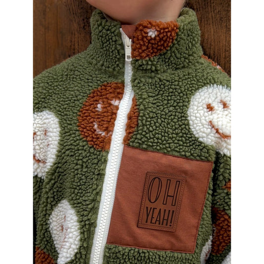 Teddystoff Jacquard Happy Faces grün rost