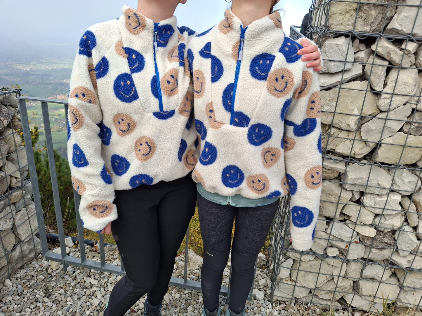 Teddystoff Jacquard Happy Faces ecru blau