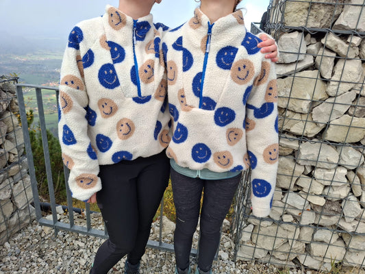 Teddystoff Jacquard Happy Faces ecru blau