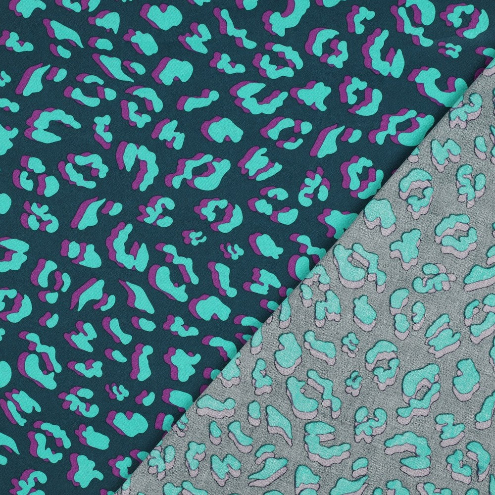 Beschichtete Baumwolle Animal Skin Leo petrol mint